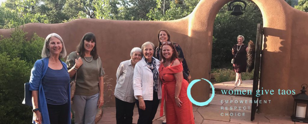 ladies on patio (2) Women Give Taos Header